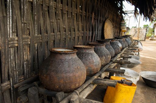 Clay pots for fermentation and distillation of palm juice and sap for local palm alcohol, palm wine, toddy wine, htan ye, near Bagan, Myanmar, Burma