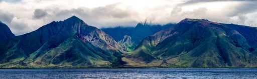 A panoramic shot of the beautiful West Maui natural reserve under a cloudy sky