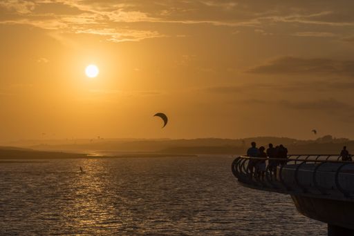 Lots of kite surfers enjoying the first sunset of 2016 at Garzon Lagoon, Maldonado, Uruguay.