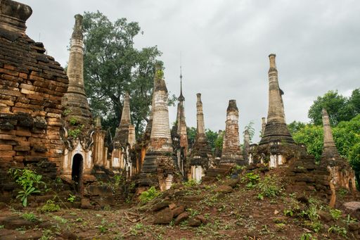 Ruins and remains of ancient Buddhist pagodas and stupas at Indein Village on a cloudy day at Inle Lake, Shan State, Myanmar, Burma, South East Asia