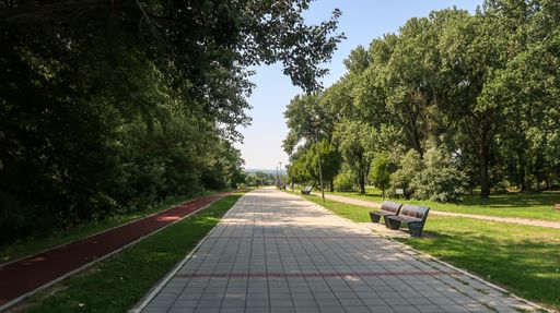 The jogging lane and benches in park in Novi Sad, Serbia