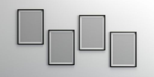 An empty wall with blank picture frames