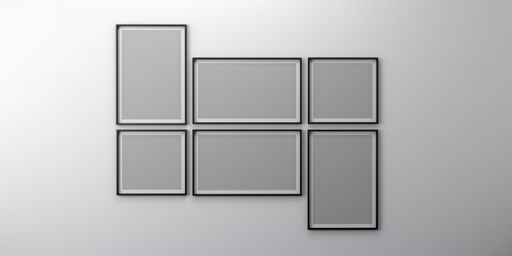 An empty wall with blank picture frames