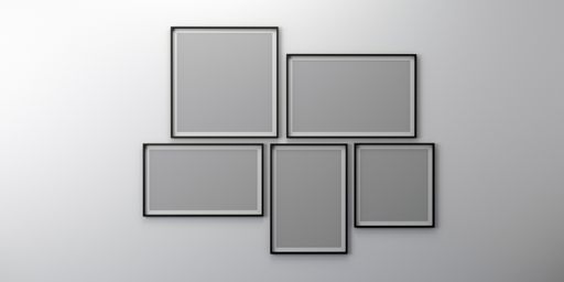 An empty wall with blank picture frames
