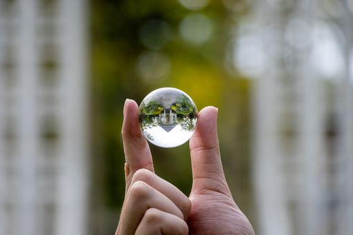 A close-up shot of hut through a glass ball
