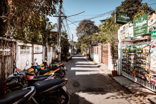 A number of motorbikes on streets of Chiang Mai in Thailand, Asia