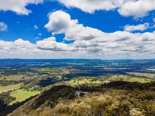 An aerial shot of Mount Mackenzie Lookout out near Tenterfield, NSW, 2372 in Australia on a sunny day