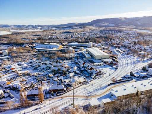 An aerial shot of Ilsenburg in winter on a sunny day in Harz, Saxony-Anhalt,Germany