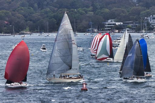 The Small yachts racing on Sydney Harbour during the 2021 Sydney to Hobart Yacht Race.