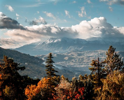 A mesmerizing view of a beautiful mountainous landscape under a cloudy sky