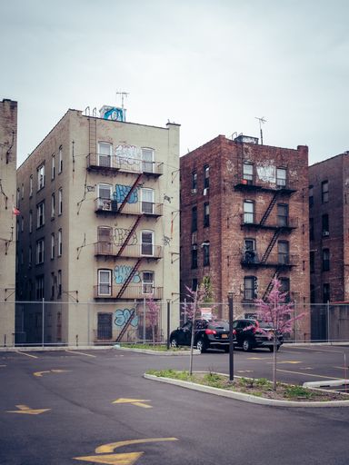 The streets and buildings of New York, United States against the blue sky