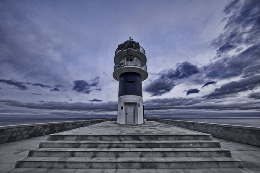 The Cabo Ortegal lighthouse on the coast of Galicia on a cloudy day in Spain