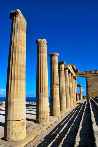 View of Columns and pillars of ancient  temples in the acropolis of Lindos in Rhodes Island, Greece