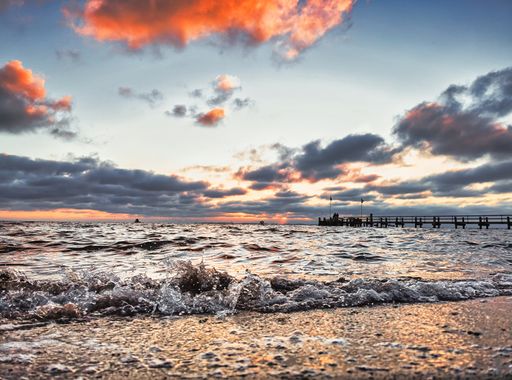 A scenic sunset or sunrise at the beach