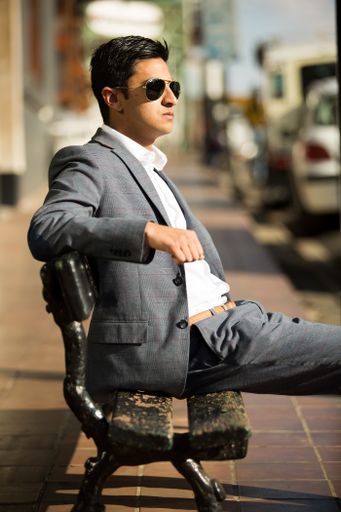 A shot of Rush Bhana, Entrepreneur and businessman sitting on a bench in the street