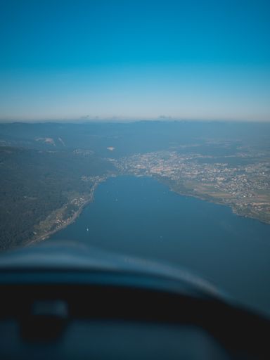 A vertical shot of a natural landscape seen from an airplane