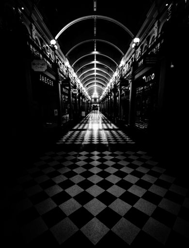 A vertical grayscale shot of hallway in Birmingham, UK
