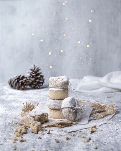 A vertical photo of sugar cookies for Christmas