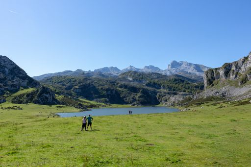 A closeup of the glacial Lake Ercina nestled among marvelous mountain tops in Spain