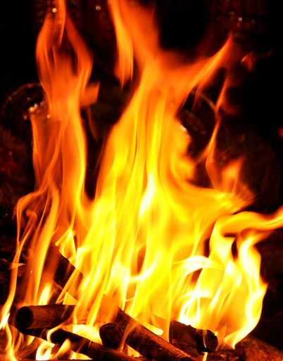 A closeup shot the fire glowing in the dark - great for wallpapers