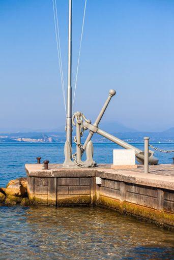 Bardolino Pier on Grada Lake in Italy during summer