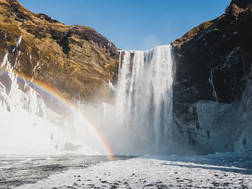 A beautiful rainbow at the Skogafoss Waterfall in Iceland