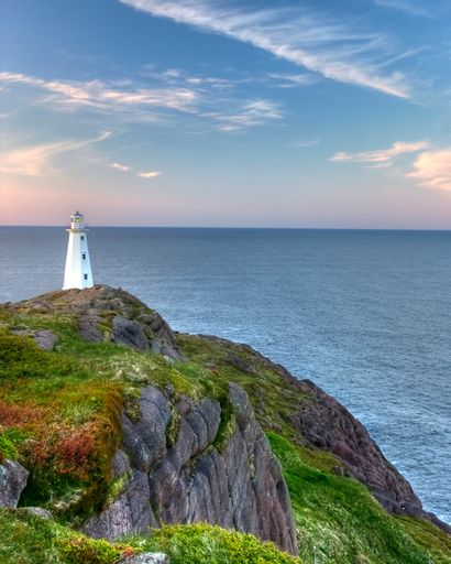The Cape Spear Lighthouse on the edge of a coastal cliff in Canada