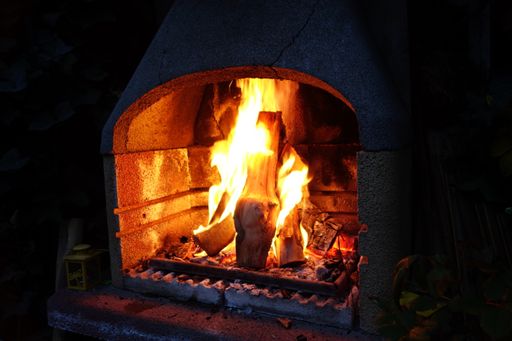 Little Fireplace with burning pieces of wood inside