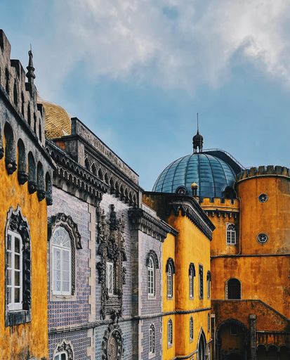 A vertical shot of the top of Pena Palace in Portugal