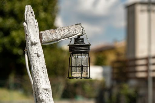 Close up detail of Lantern in the garden during day
