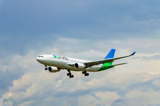 The Airbus A320 plane of the company Level landing at the Prat airport in Barcelona, Spain