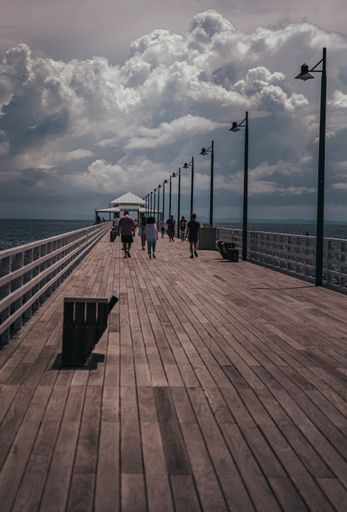 A vertical shot of the cloudy sky over Shorncliffe Jetty in Queensla in summer