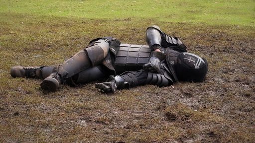 A medieval knight fallen in a battlefield