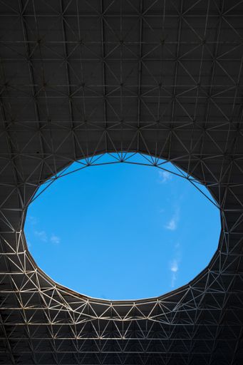 A view from stadium to a blue sky