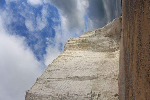 A vertical shot of white cliffs of the Seven Sisters