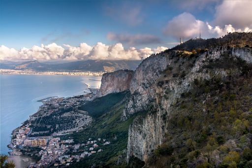 An aerial shot of a seaside city in Sicily, Italy