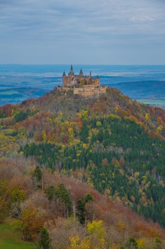 A vertical shot of the historic Hohenzollern castle on a hill in Bisingen, Germany