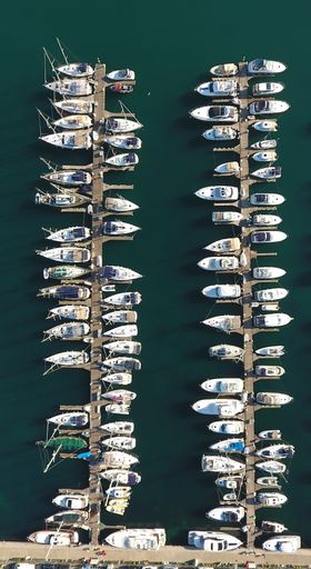 A top view of a parked motor yachts in the Yacht marina