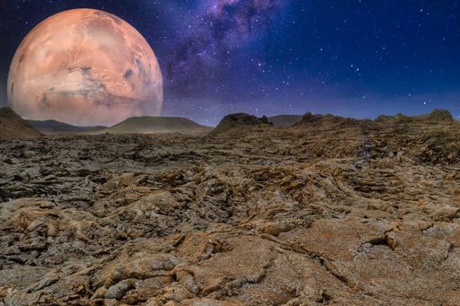 A breathtaking shot of an alien planet rocky surface on a starry sky and a big planet background- perfect for alien planet concept