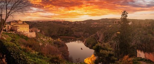 The sunset on the river Tagus in the medieval city of Toledo in Castilla La Mancha, Spain.