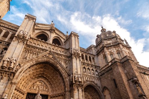 A low angle shot of the beautiful facade of Santa Iglesia Catedral Primada de Toledo. Toledo, Spain.