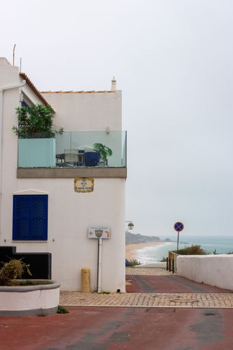 A vertical shot of the building on the cloudy December morning in the old town of Albufeira, Portugal