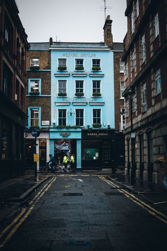 A vertical shot of the iconic and colorful building located in Soho street in London, Great Britain