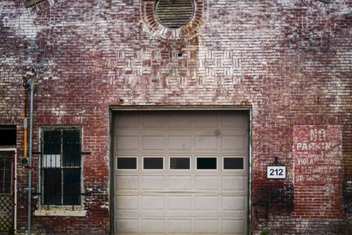 A closeup of a closed garage in an old building