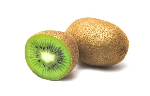 A closeup shot of the juicy kiwis on the white background