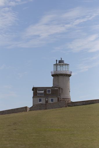 A vertical shot of Belle Tout Lighthouse in Beachy Head, East Sussex