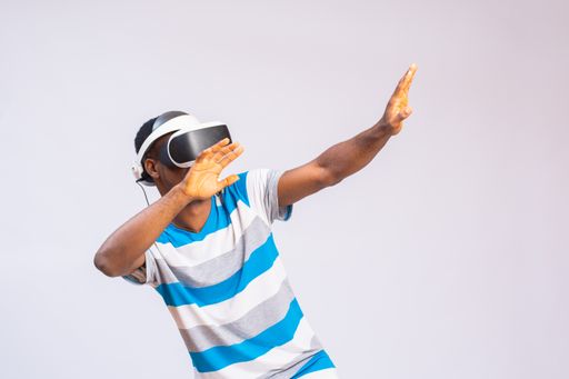 A closeup of a young man wearing a virtual reality headset