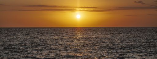 Sunset sea detail, banner image with copy space