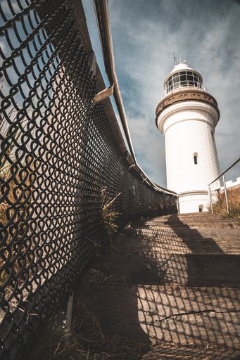 The vertical shot of the white light house