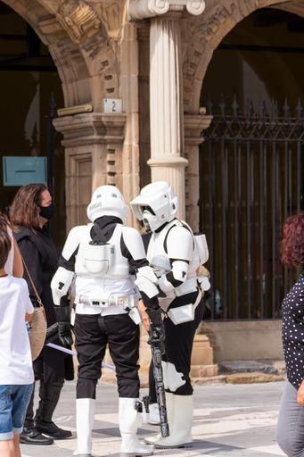 The actors representing Star Wars characters with their flashy uniforms